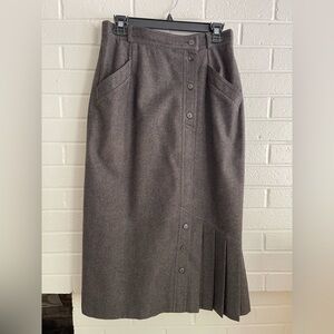 Escada Gray/Brown wool gaberdine skirt. Front kick pleats and pockets. Size 40.